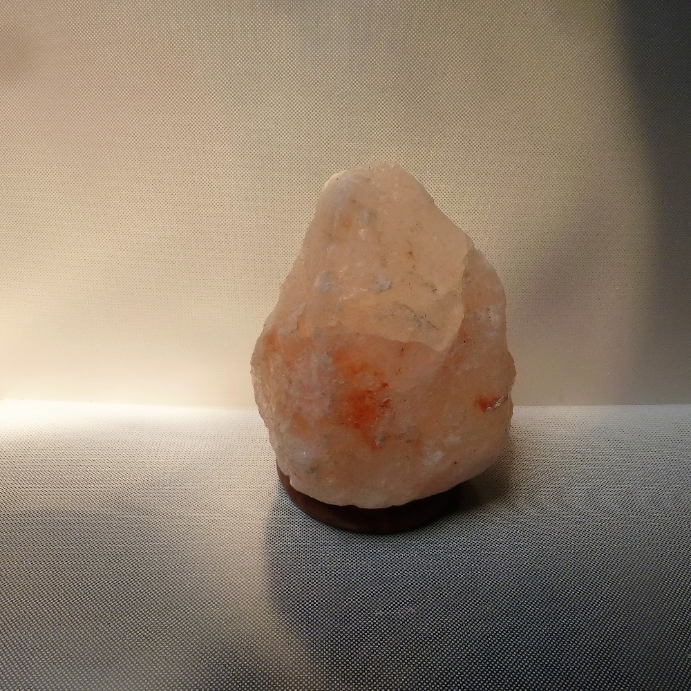 Himalayan salt lamp with wood base